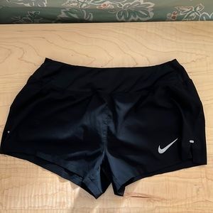 Nike. Size small. Dri fit running short. Black.